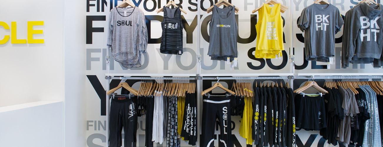 Custom branded apparel from Soulcycle has helped to drive brand loyalty and differentiate their brand from their competitors.